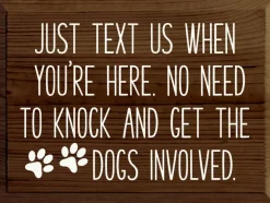 Sign: Just text us when you're here. No need to knock...