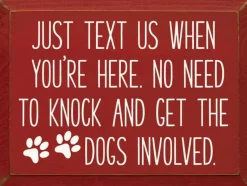 Sign: Just text us when you're here. No need to knock...